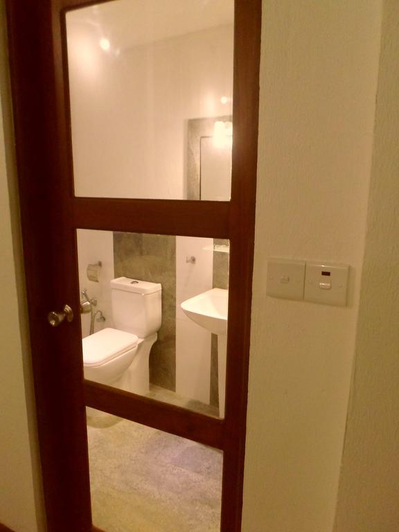 Nilas Guesthouse ฮิกคาดูวา ห้อง รูปภาพ